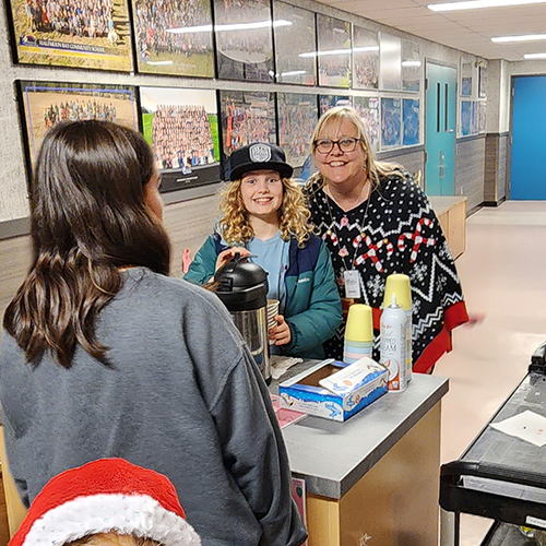 The students of Halfmoon Bay Elementary will be serving hot chocolate topped with whipped cream.